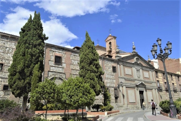 a church with a clock on the side of a building