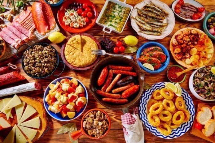 many different types of food on a table