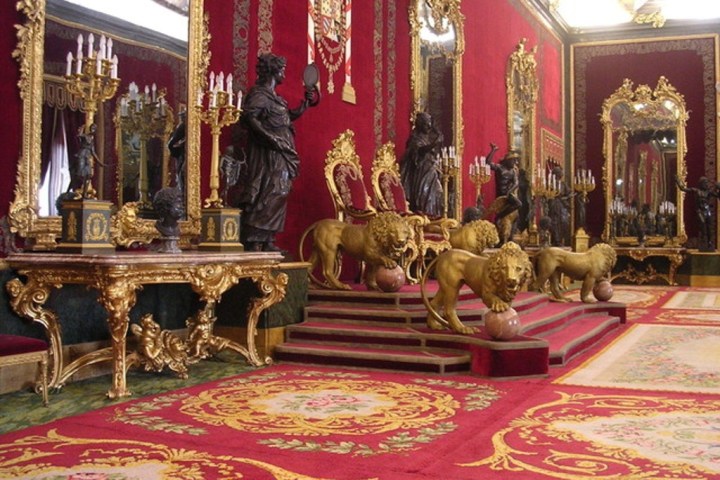 a group of people sitting on a rug