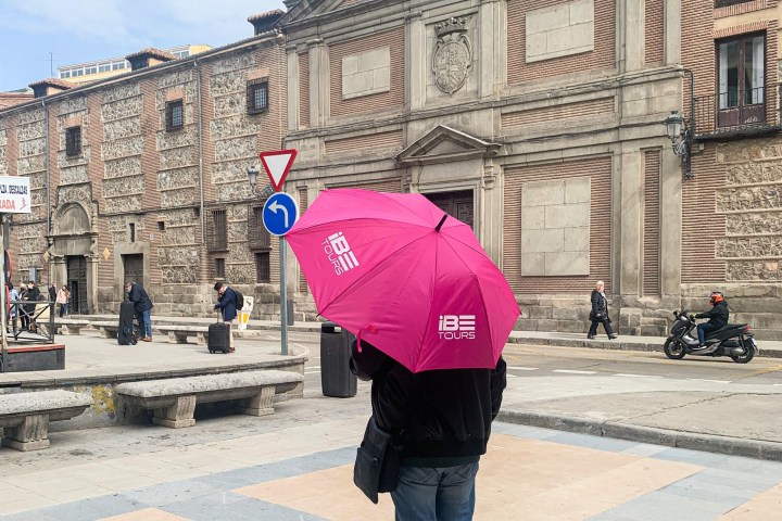 a person standing in front of a building