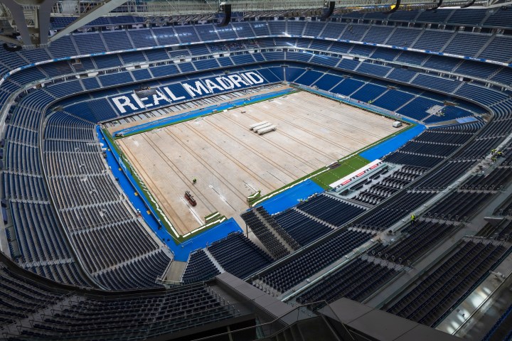 a building with a metal fence
