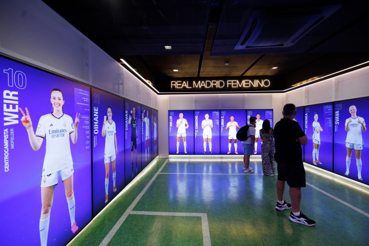 a group of people standing in a room